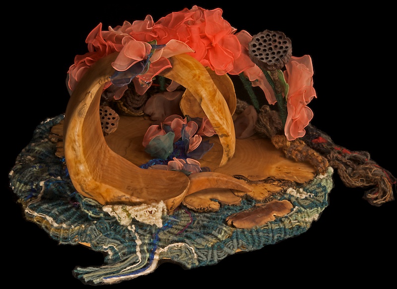 Lotus Eaters sculpture, wood with silk petals and lotus seed pods